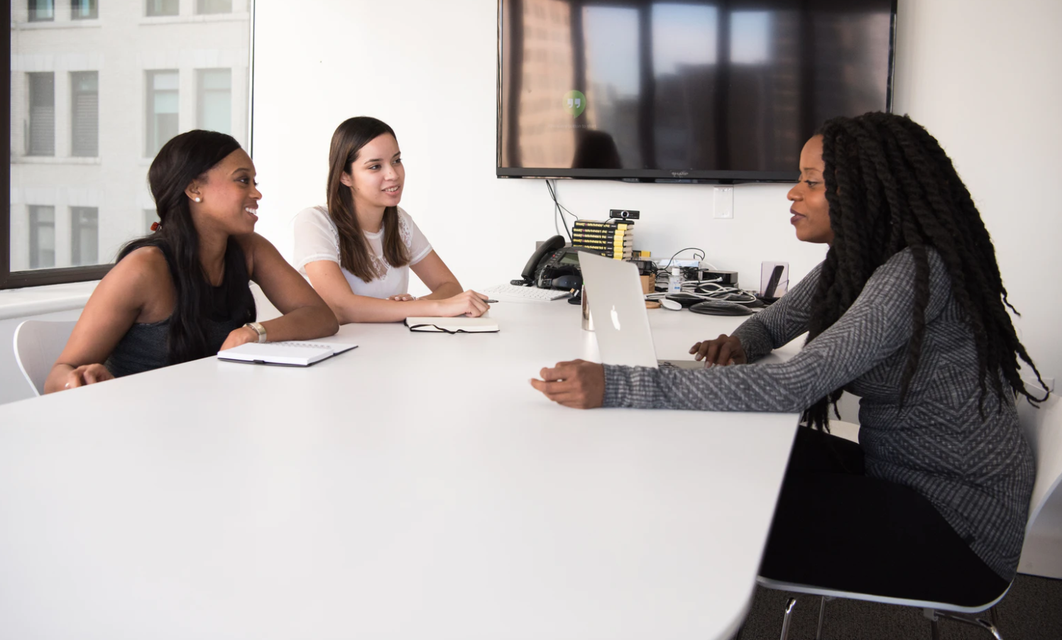 Women working through a job training program