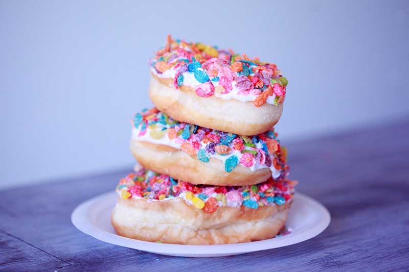 Three stacked donuts