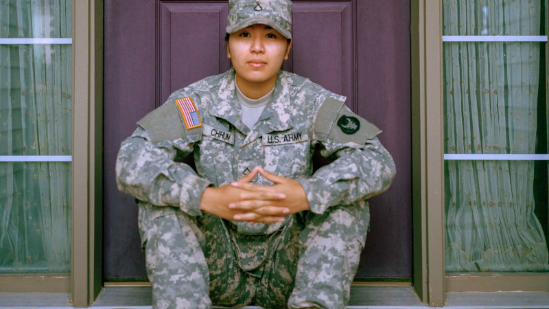 U.S. soldier sitting on stoop