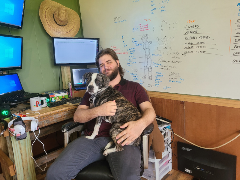 Coding Dojo graduate Zach Jones and his dog
